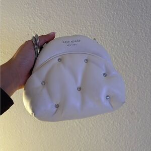 Kate Spade Cream Wristlet with Silver Accents